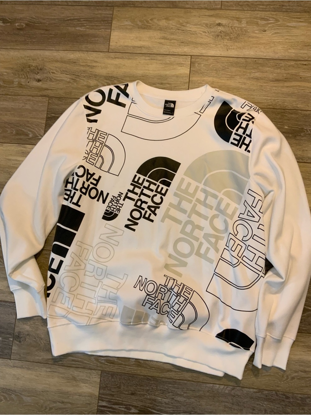 The North Face White Crewneck Sweater with Black & Gray Logo Print